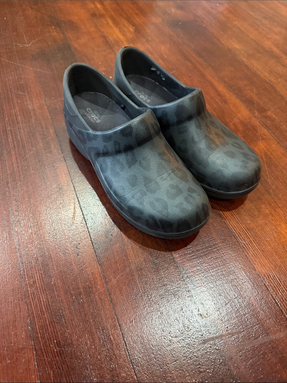 Crocs Slip-On Clogs in Black Leopard Print